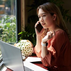 Businesswoman Answering Phone Calls
