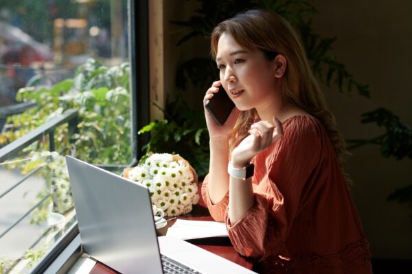 Businesswoman Answering Phone Calls